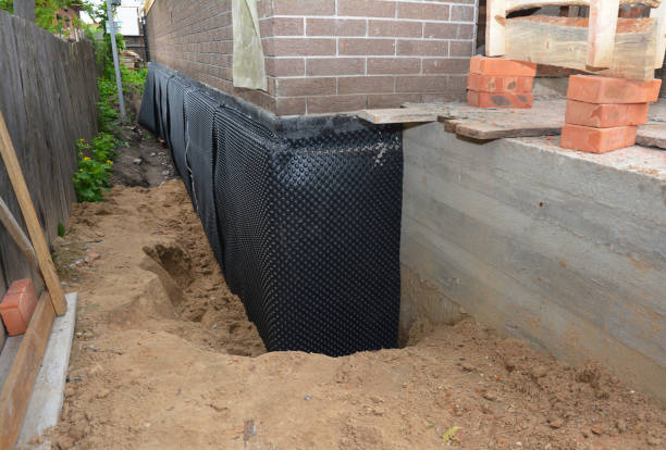SJ Waterproofing Pros technician performing targeted Foundation Crack Repair assessment in Zionsville, IN